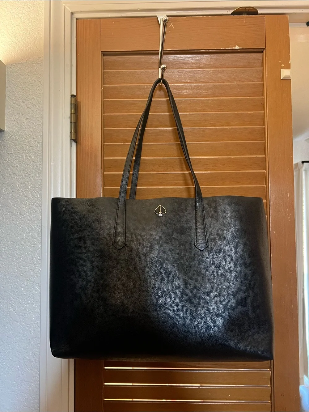 kate spade Black Leather Tote with Spade Emblem with attachable wallet